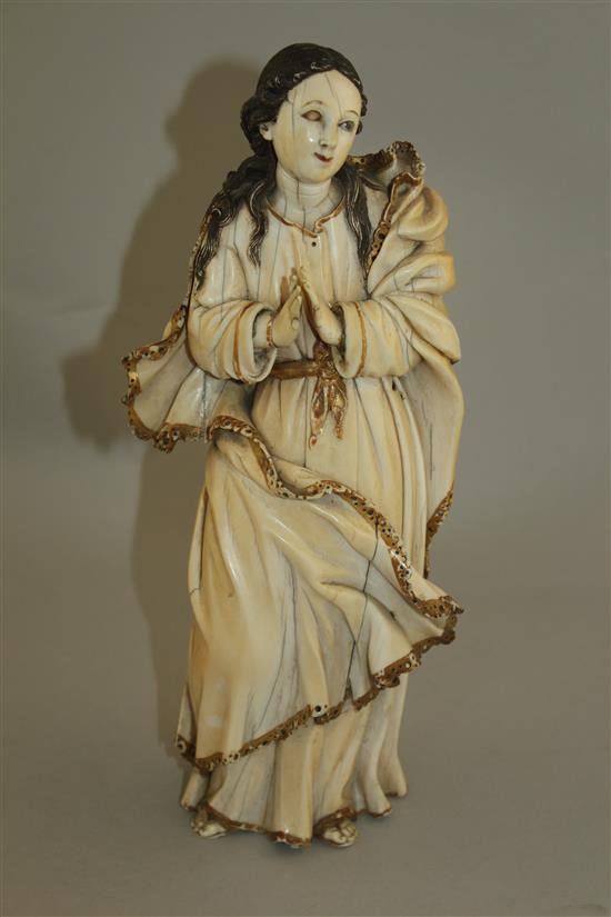 An 18th century Indo-Portuguese carved ivory figure of the Virgin Mary, probably Goa, c.1740-50, 11.5in.